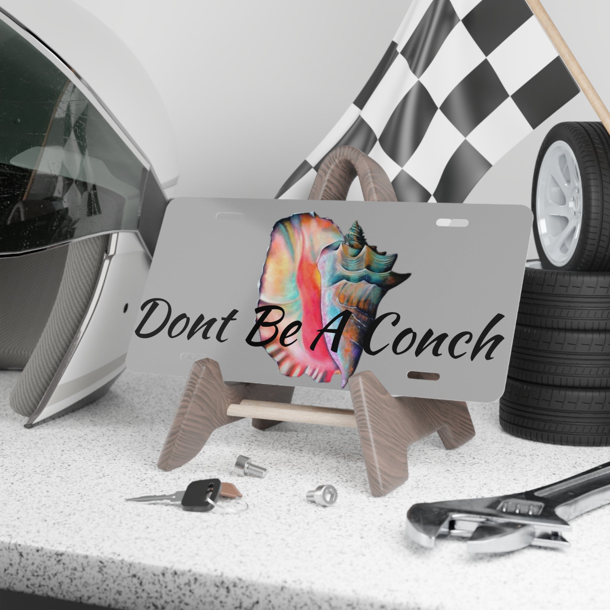 Dont Be A Conch license plate detail — bold island humor, 30.5 x 15.2 cm