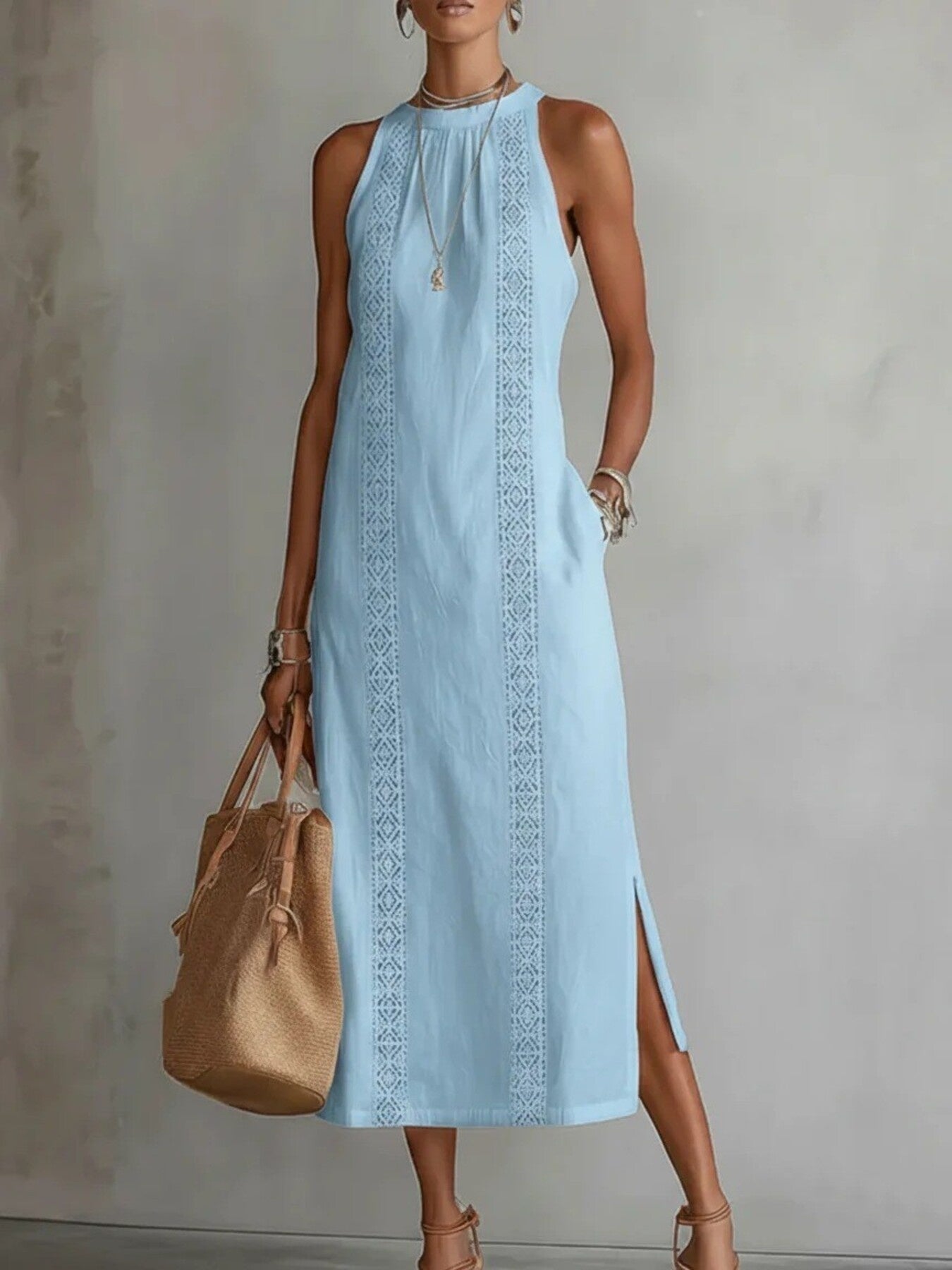 Light blue dress with intricate patterns on a neutral background